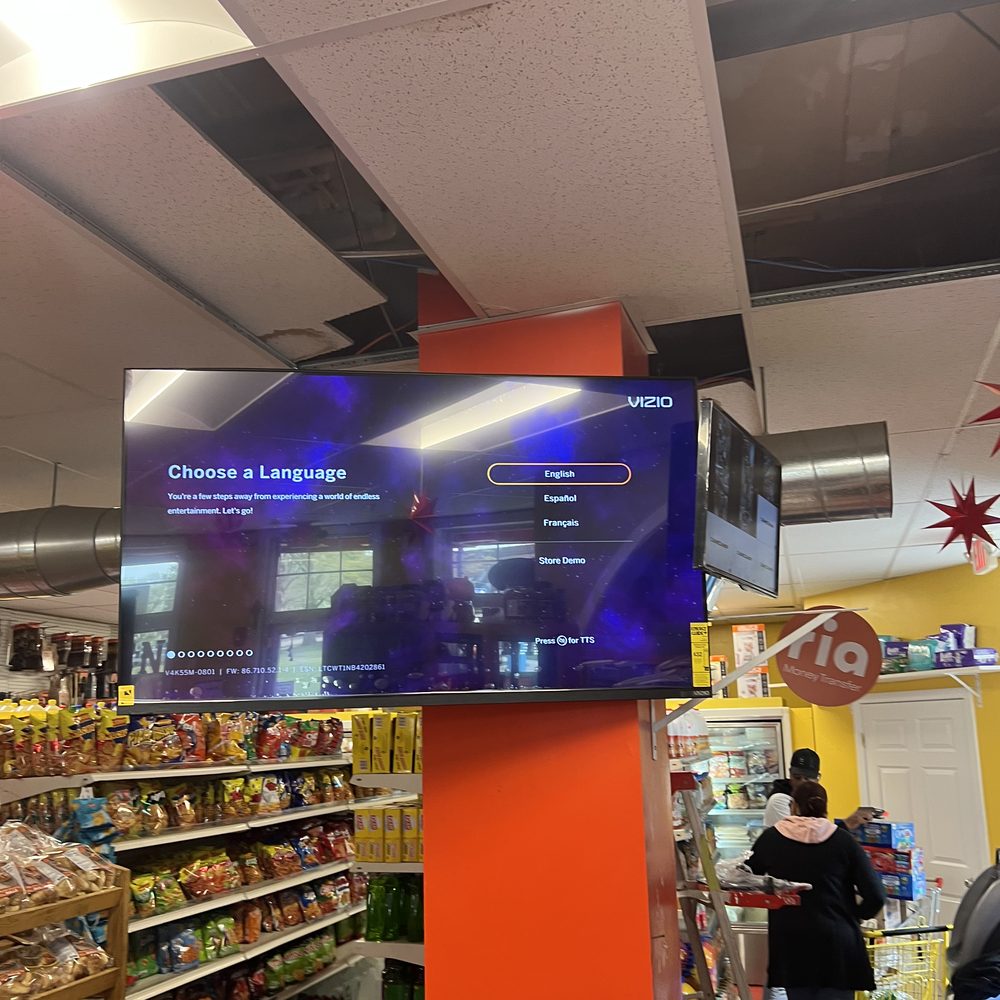 Television mounted on a column inside a retail store